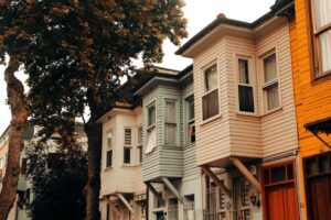 Residential home exterior with clean siding and trim on a sunny day
